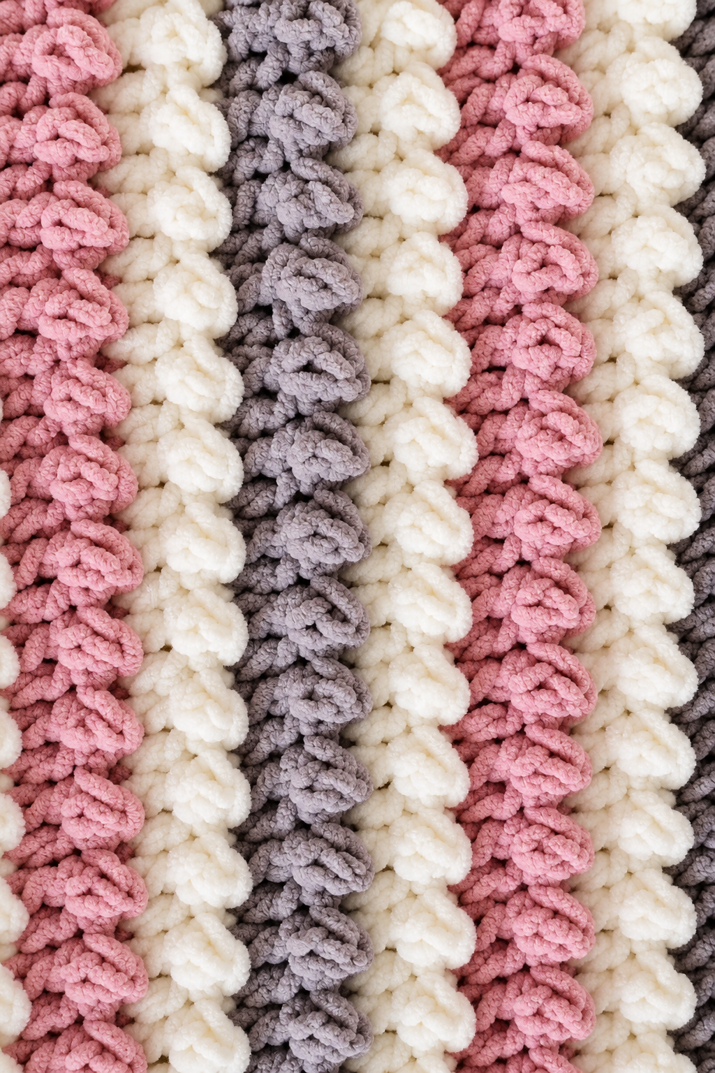 Close view of 6 weight yarn crochet blanket texture