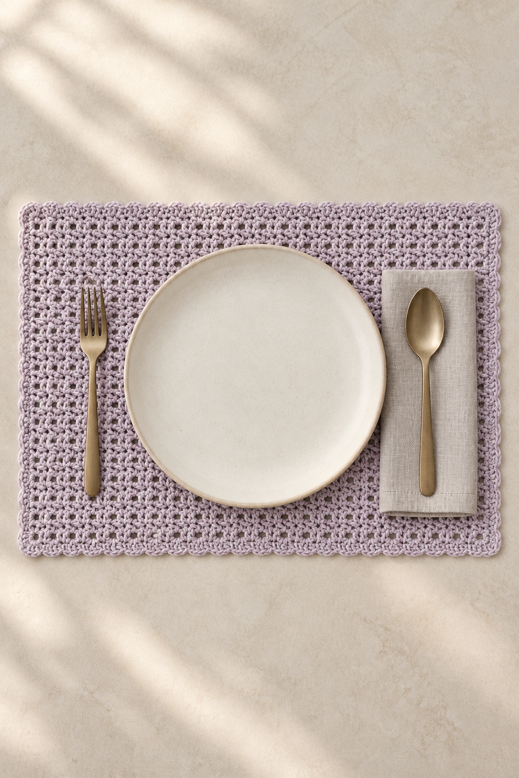 crochet placemat pattern shown at a table setting