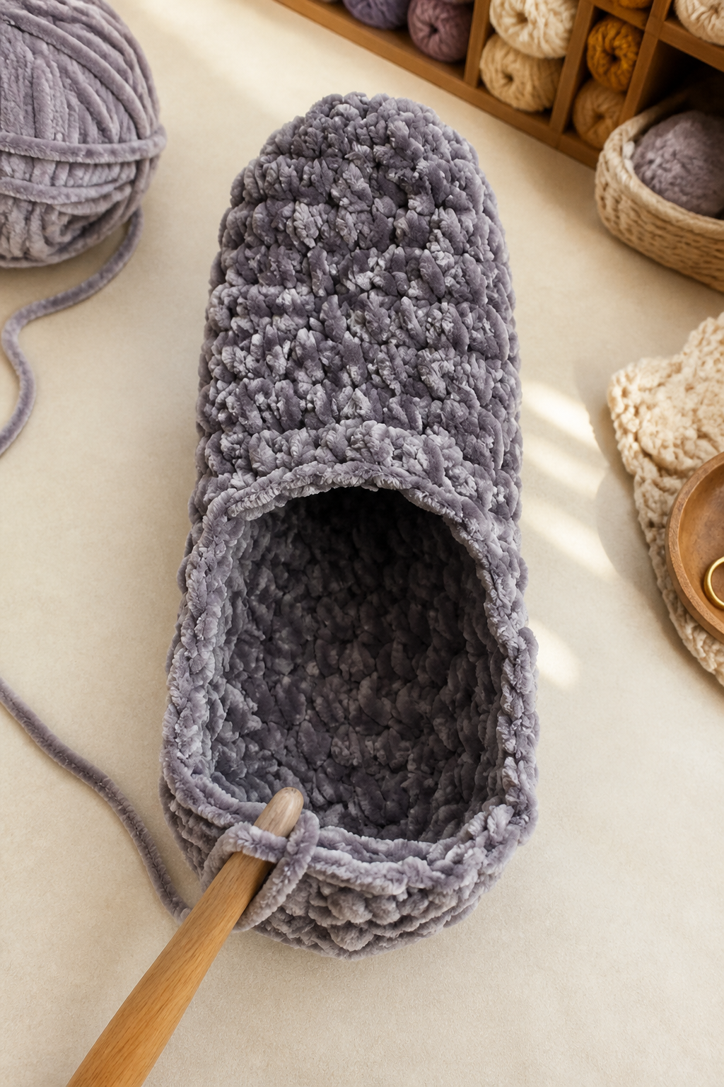 Gray velvet slipper opening with visible toe-side decrease shaping