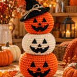Crochet jack-o-lantern pumpkin stack with a witch hat